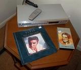 Another nice VCR with remote on octagonal occasional table with bottom shelf.   GREAT ELVIS collectables!