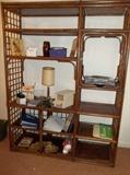Here's a full front view of this nice rattan etagere with plenty of room for a TV!