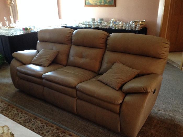 Leather sofa with motorized recliners - recline with a push of a button!