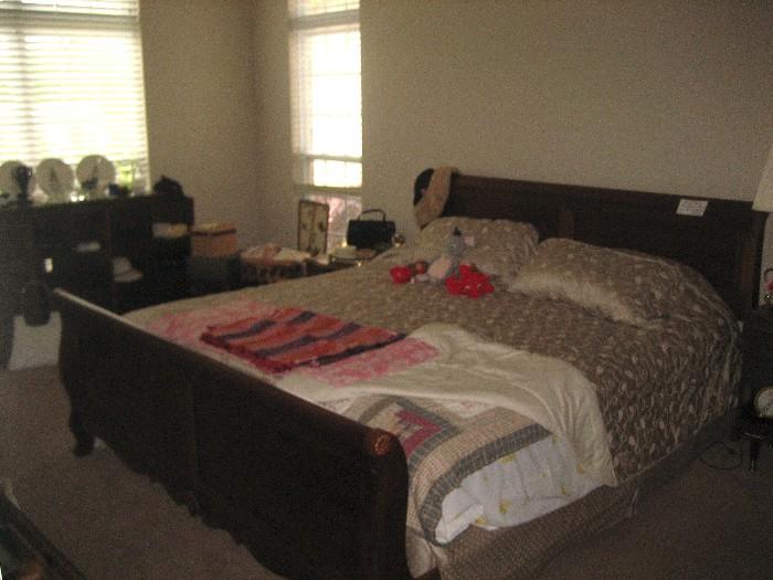 Massive King size bed with rails, mattress, and box springs.