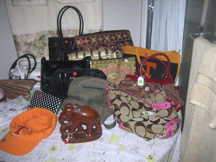 Collection of purses and handbags.