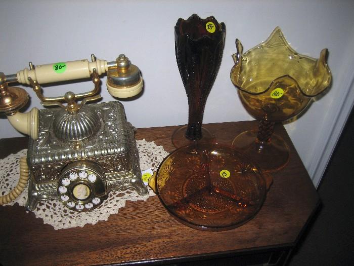 Nice antique rotary phone along with nice glassware.