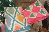 Hand quilted, hand made from vintage fabric -- pristine condition!