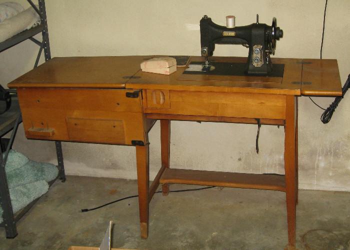 White Rotary 77 sewing machine & cabinet with original tools and manual