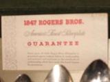 1847 Rogers brothers silverplate dinnerware with original case and the guarantee