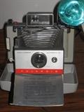 Vintage Polaroid automatic 104 land camera with flash attachment in original case, Billows  perfect. has original cold clip card with it