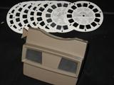 vintage GAF view-master with seven desk [3 grand Tetons, three Yellowstone National Park, and one Snoopy]