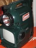 Coleman emergency 5 inch black and white TV, AM/FM radio, torch lantern, and siren