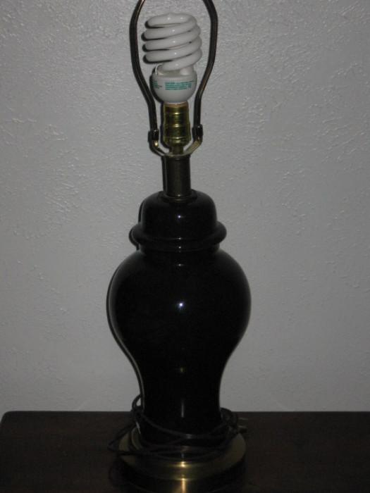 one of two matching bedside lamps