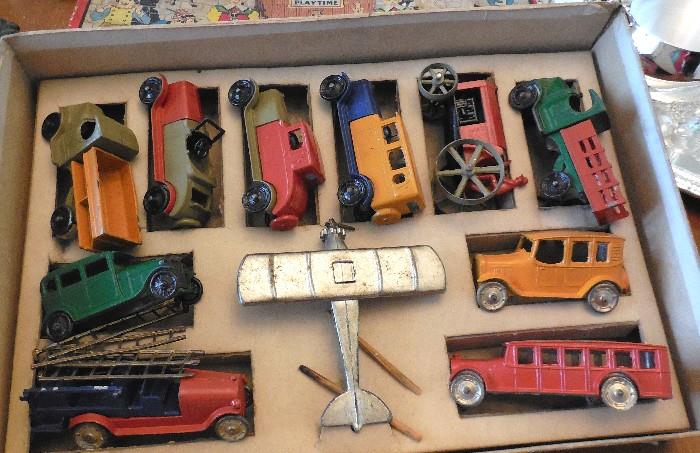 1930's Metal Tootsie Toy Cars, Trucks and Airplane in original Box. 
