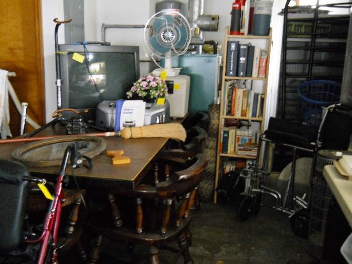 table w/captain chairs, TV, metal storage cabinets, etc.