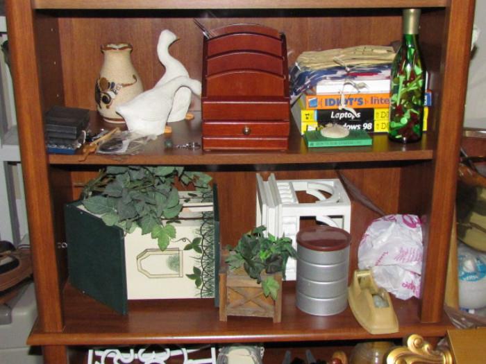 Bookshelf and lots of collectibles and decorative items