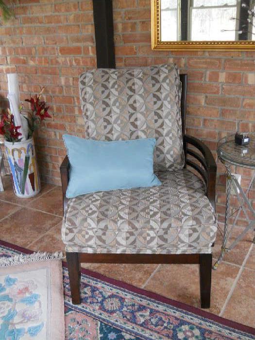 Sidechair.  Notice rugs to be sold