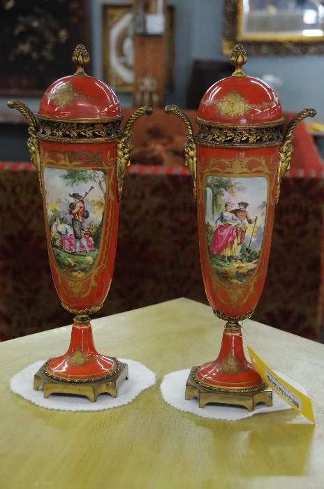 Pair of small Vienna style covered urns