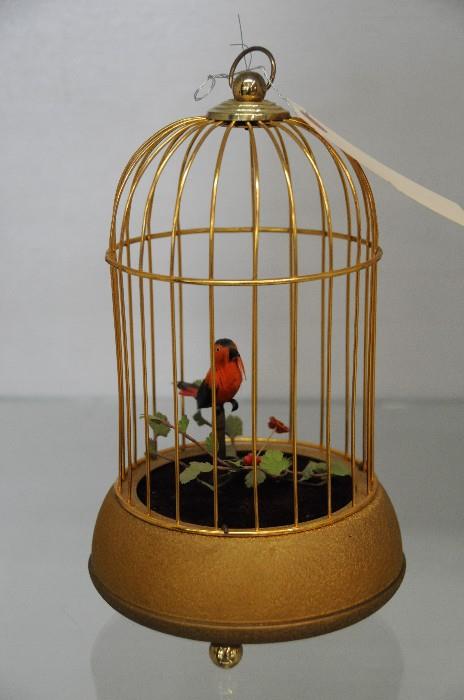 Automaton bird in cage