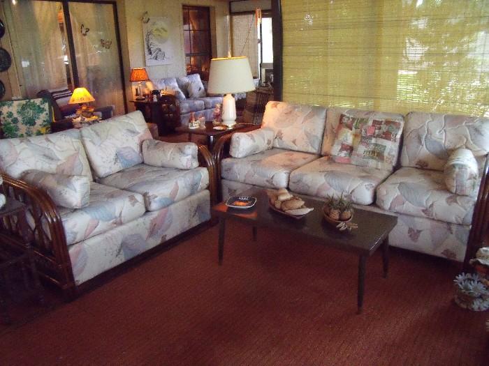 Cream background rattan couch and love seat