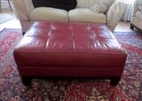 Large red leather ottoman