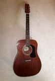 G. Washburn acoustic guitar