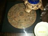 Oriental zodiac under glass end table