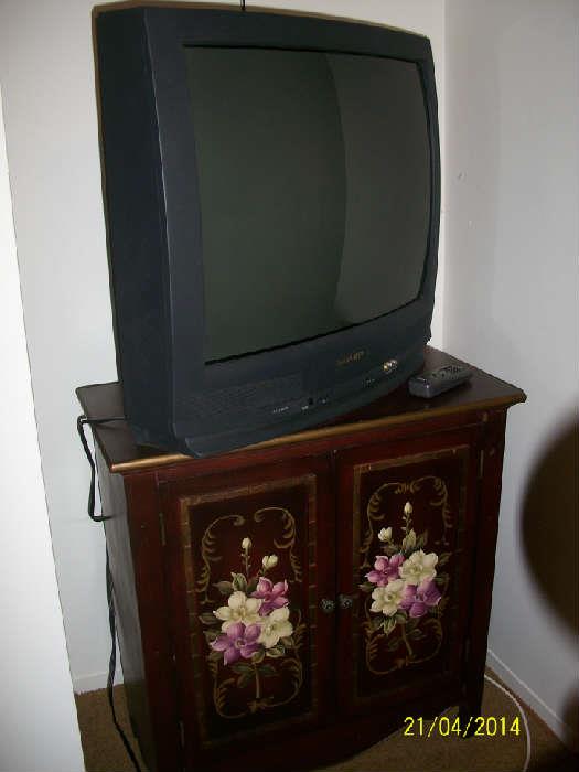 painted cabinet and TV