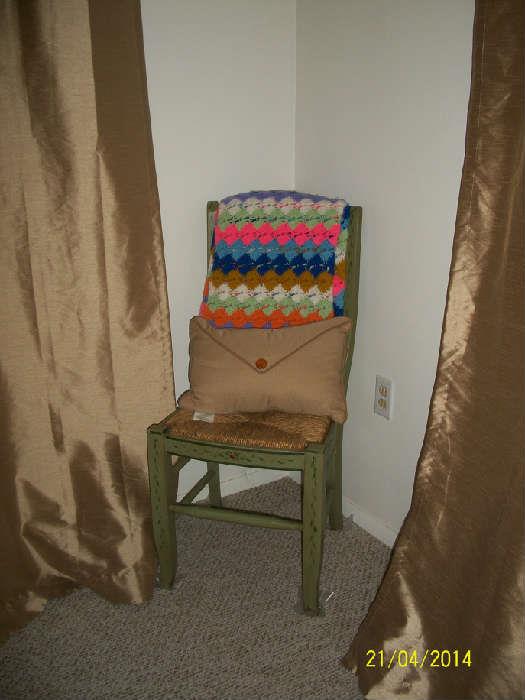 painted green chair with rush seat