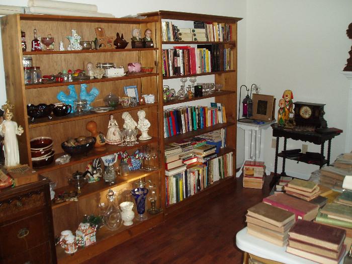 books, antique tables, lots of glassware