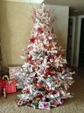 Beautiful pre-lit flocked Christmas tree from Garden View in northville, Mi. Asking $300. New $700.