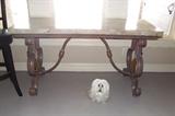 Full view of Ernest hemmingway marble table with brass details. (Dog not included:)
