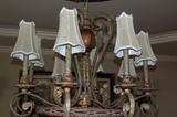 Metropolitan upclose picture of dining room chandelier. Sold with Medallion.