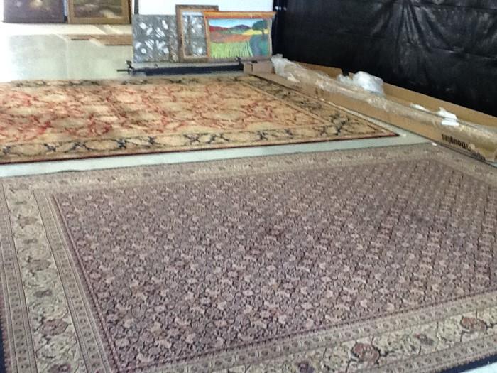 3 large and several smaller rugs