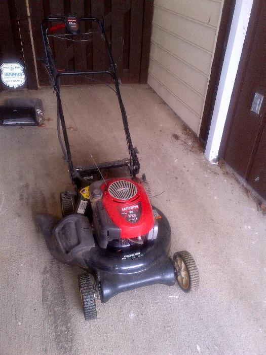 Craftsman 21" self-propelled lawnmower with optional electric-start feature.