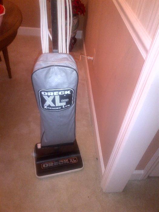 Oreck XL 888 upright vacuum. An early model, but still runs great, plenty of suction!
