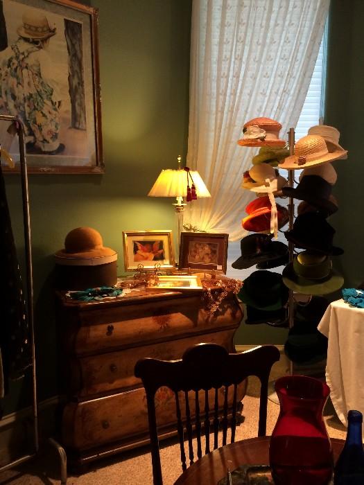 vintage hats; chest of drawers; prints; frames