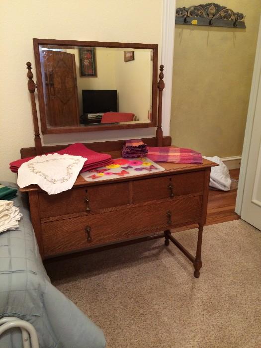 antique small dressing table with mirror, linens