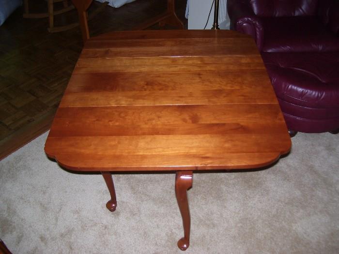 Tops of Cherry wood end tables