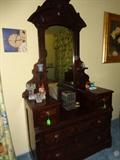 Antique Lincoln dresser, Wedgewood, glass and gnome figurine decoratives