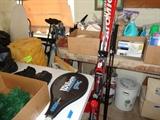 Skis, boots, polls, tennis racket, golf clubs, motorcycle helmet