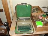 Vintage manual typewriter with case; mason jars