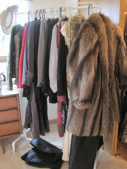 Upscale lovely women's clothing: dress suits, casual suits, tops, dresses, vintage and current and Raccoon coat size large.
