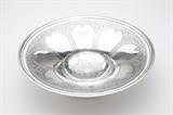 Lot# 1013 A Tiffany & Co. sterling silver centerpiece bowl 1907 - 1947 (Directorship of John C. Moore II), maker's mark ''Tiffany & CO. / 20157A makers 17837 / Sterling Silver / 925-1000 M'', the circular tapering bowl chased to interior with a foliate medallion surrounded by radiating scalloped reserves within foliate borders, on a circular foot, monogrammed to interior ''DVH'', 3.25'' H x 12'' Dia., 28.8 oz troy approximately, est: $1000/1500