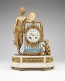 Lot# 1063 A French gilt bronze, porcelain and marble mantle clock Late 19th century, in the Louis XVI style, the circular hinged aperture enclosing a white enamel dial with black Roman hours and Arabic five-minute marks and pierced gilt hands, attached to a twin-wind movement, within a columnar case flanked by a classical female figure holding a portrait medallion and an infant playing with a dog, on a shaped oblong base, with winding key, 14'' H x 10'' W x 6.25'' D, est: $800/1200