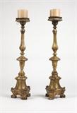 Lot# 1076 A pair of Continental carved giltwood pricket sticks
 
19th century, of baluster form on tripartite bases, 2 pcs, 45'' H x 12'' Dia., est: $1500/2500
