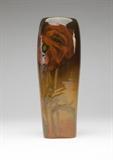 Lot# 1155 A Rookwood Pottery 'Standard' glaze vase
 
1900, Cincinnati, OH, with ''RP'' mark with 14 flames, impressed ''821 C'', and with incised decorator's initials ''LEL'' for Laura E. Lindeman (active 1899 - 1905), the circular rim over a tapering body on a square base, decorated with red poppies and green foliage on a shaded brown-to-amber ground, 10.5'' H x 3.5'' Dia., est: $400/600