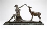 Lot# 1167 Marcel-Andre Bouraine (1886 - 1948 French)
 
signed ''BOURAINE'' and ''Etling. Paris'', depicting a seated maiden feeding a deer, patinated and silvered bronze, on a stepped marble plinth, the bronze alone 11'' H; overal 12.25'' H x 23.5'' W x 5.5'' D, est: $2000/3000
