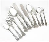 Lot# 1207 A Wallace ''Berain'' sterling silver flatware service Introduced 1907, Wallingford, CT, with maker's mark ''RW & S'' with stag's head, further marked sterling, an assembled service comprising: 14 forks (7.5''), 8 forks (7''), 5 salad forks (6.125''), 8 salad forks monogrammed ''C'' (6.125''), 9 oyster forks (5.5''), 7 teaspoons (5.875''), 2 teaspoons monogrammed ''h'' (5.875''), 1 teaspoon monogrammed ''C'' (5.875''), 10 five o'clock teaspoons monogrammed ''K'' (5.5''), 6 five o'clock teaspoons monogrammed ''A'' (5.5''), 1 five o'clock teaspoon monogrammed ''C'' and engraved to bowl ''Castle Park'' (5.5''), 1 five o'clock teaspoon engraved to bowl ''Norfolk, Neb.'' (5.5''), 4 fruit spoons (5.875''), 6 round bowl soup spoons monogrammed ''M'' (5.375''), 11 oval bowl soup / dessert spoons (7''), 5 serving spoons (8.125''), 1 sugar spoon (6''), 2 flat handle butter spreaders (6''), 4 flat handle butter spreaders monogrammed ''M'' (6''), 1 cold meat fork (8.5''), 12 ''Old Frenc