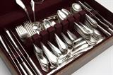 Lot# 1208 A Durgin ''Chatham'' sterling silver flatware service Designed 1915, Concord, NH, with maker's marks, further marked ''Sterling'' and ''Pat'd'', comprising: 8 forks (7.875''), 8 forks (7.25''), 8 salad forks (6''), 11 teaspoons (5.5''), 8 oval bowl soup spoons (7.125''), 8 gumbo spoons (7''), 12 cream soup spoons (5.375''), 8 egg spoons (5.5''), 9 orange spoons (5.75''), 11 demitasse spoons (4.25''), 8 iced tea spoons (7.5''), 8 gilt-washed salt spoons (2.625''), 8 hollow handle silver plate-bladed knives (9.625''), 8 hollow handle silver plate-bladed knives (8.625''), 9 flat handled butter spreaders (5.125''), 3 serving spoons (8.625''), 1 gravy ladle (5.75''), 1 cream ladle (5''), 1 olive fork (5.5''), 1 lemon fork (5''), and 1 hollow handle silver plate-bladed cheese knife, most monogrammed ''C'', 140 pcs, together with an associated canteen, weighable sterling 116.3 oz troy tw approximately, est: $2000/3000