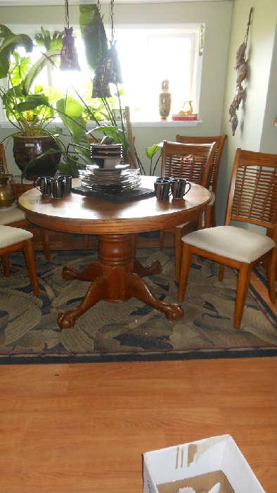 Round Oak Pedestal table with a 24" leaf $150.00