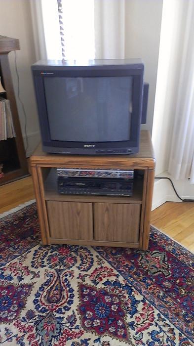 Television, DVD/VHS player and CD player.