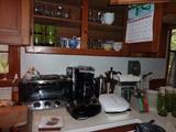 Cuisinart toaster oven, Mr. Coffee, Braun waffle maker, George Foreman Grill, (2) scales, (2) percolators, Juicer, can opener, electric knife