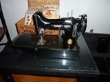 Vintage Singer machine with case